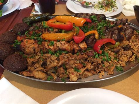 Zaytoon lansing - One of our most popular platters is the Toon for Two! Fried Kibbie, Chicken Kabob, Beef Kabob, Chicken Shawarma, Lamb Grape Leaves, Falafel, Rice, Grilled veggies and a side of garlic & tahini...